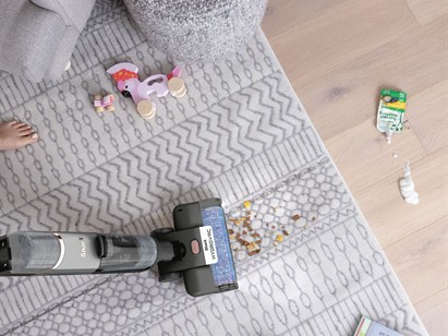 Vacuums, mops & cleans itself at the same time