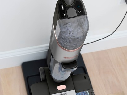 Vacuums, mops & cleans itself at the same time